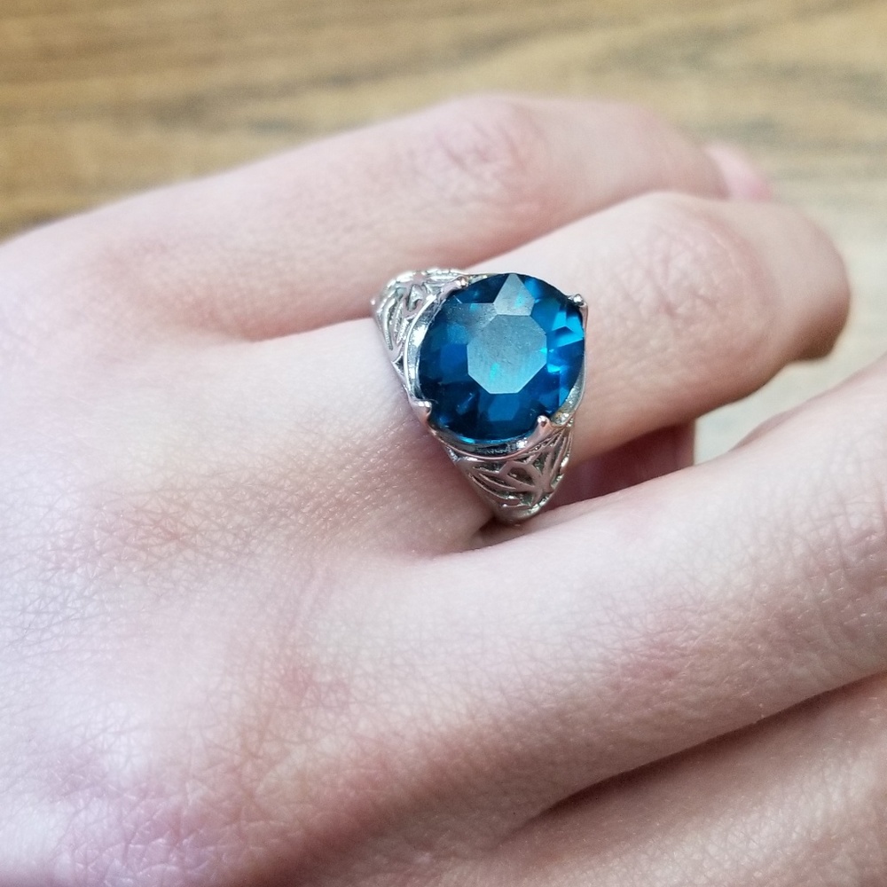 Silver ring with blue stone